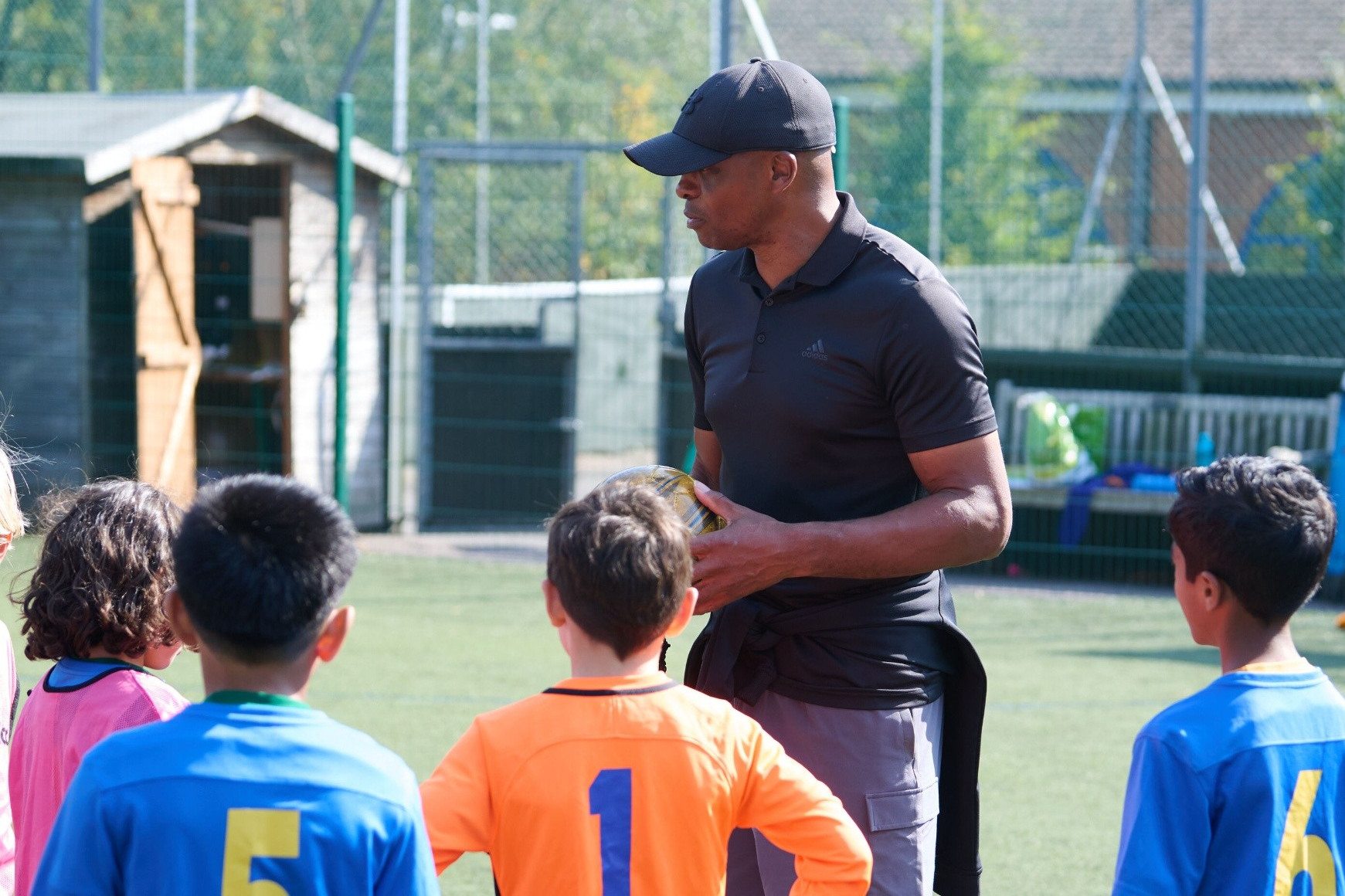 Loyola boy with sports coach