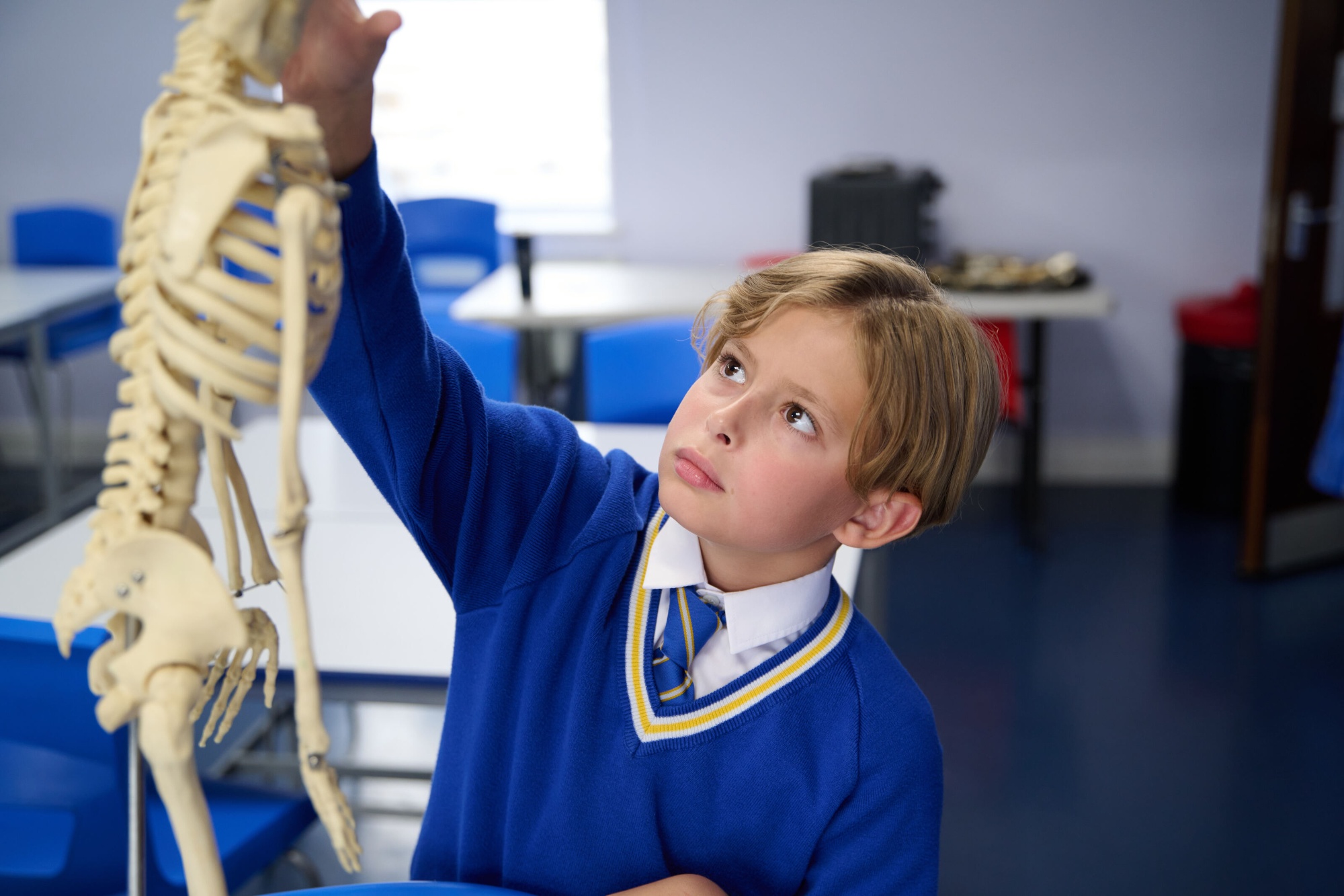 Loyola boy in science room