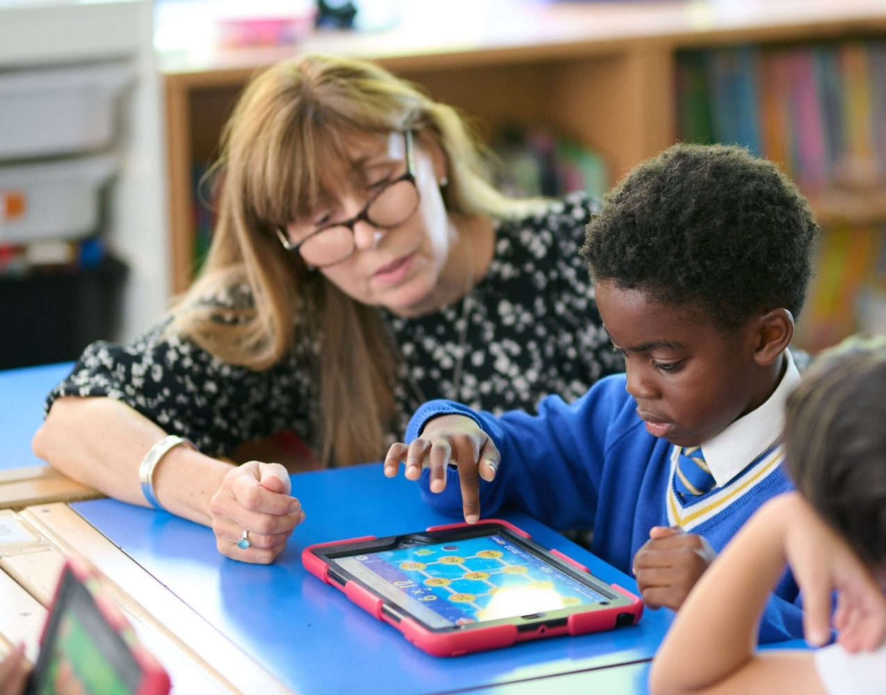 Loyola Prep pupil on an ipad