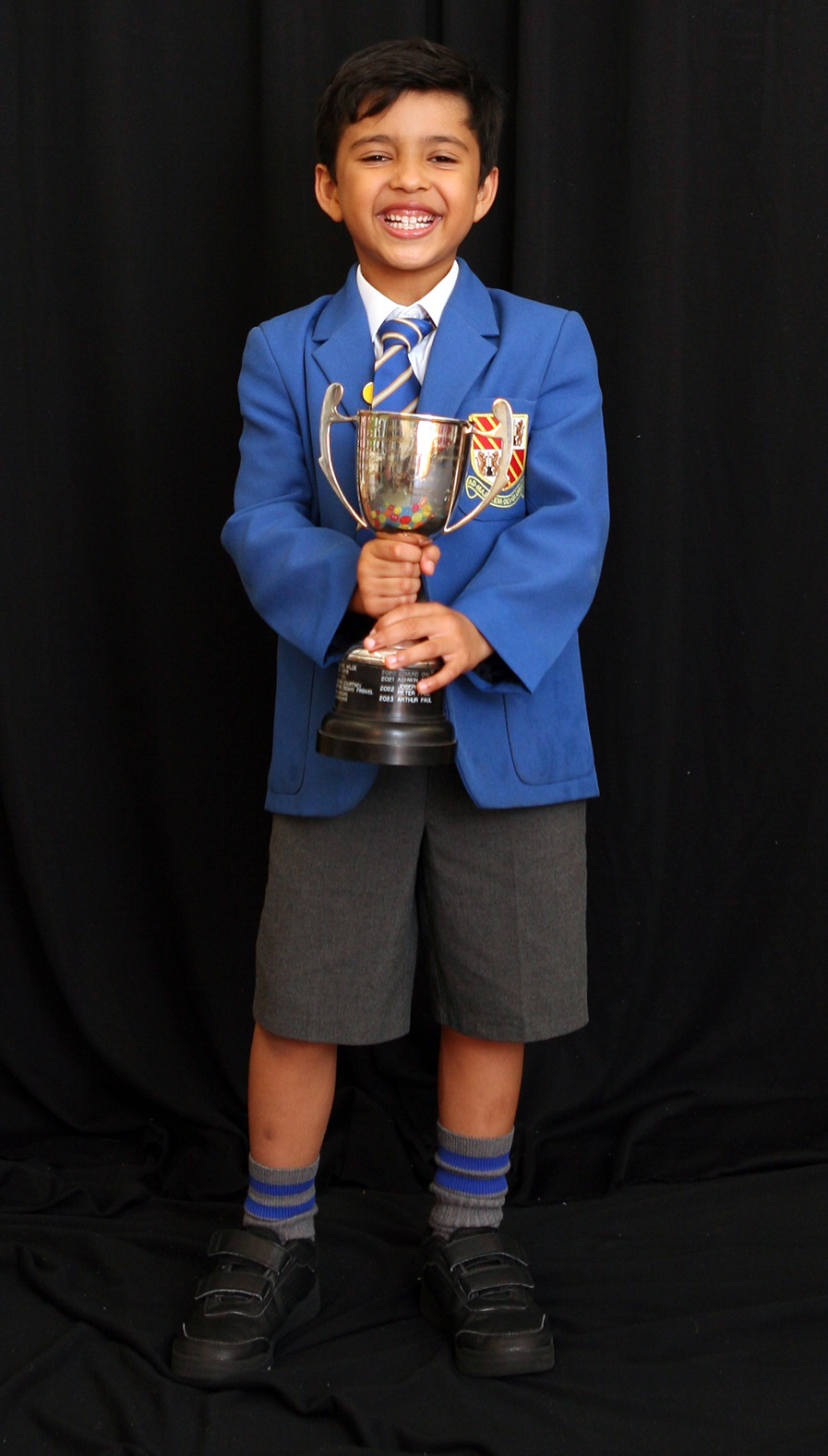 Loyola pupil with Hume Scholarship cup