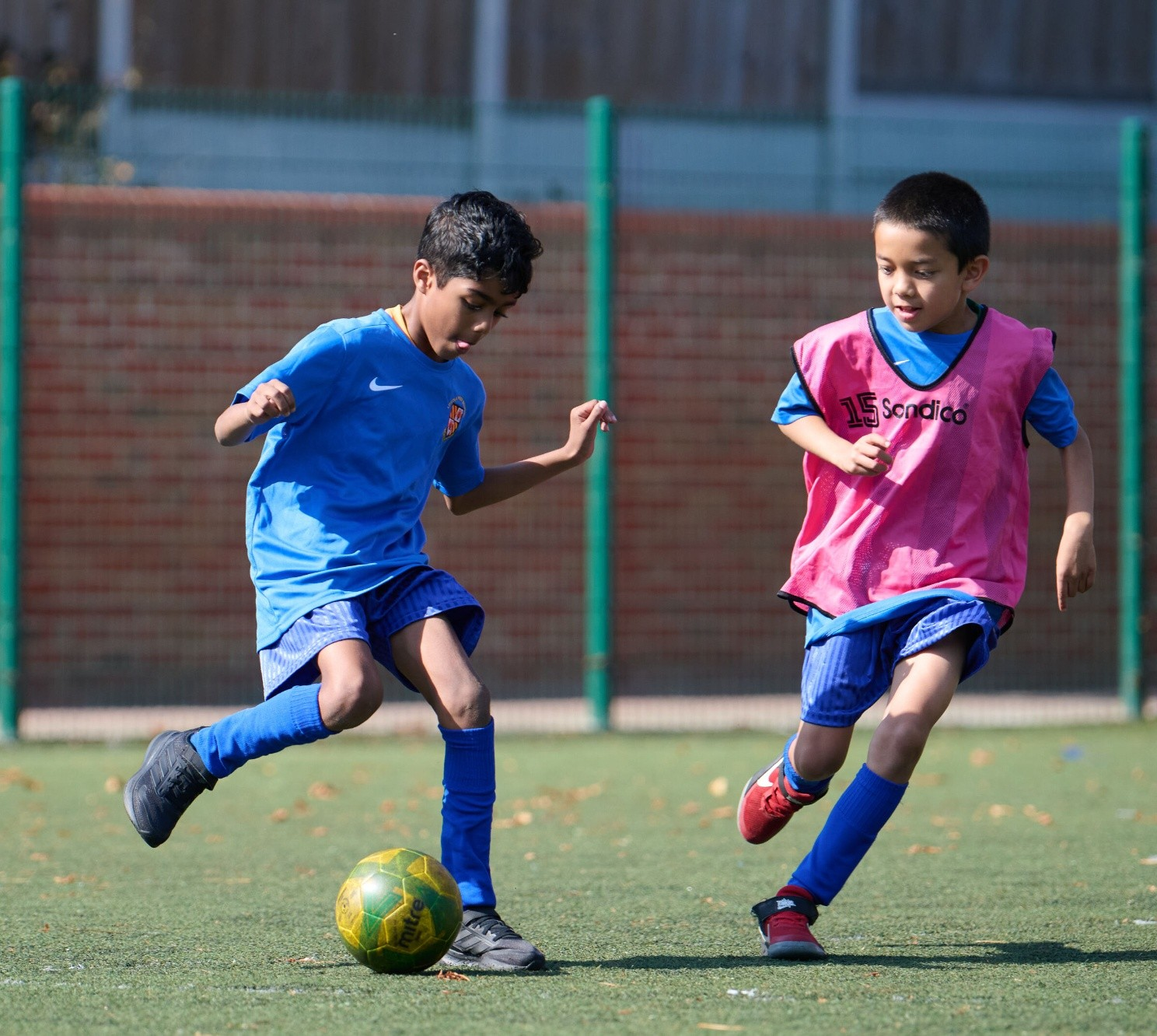 Loyola boys playing football