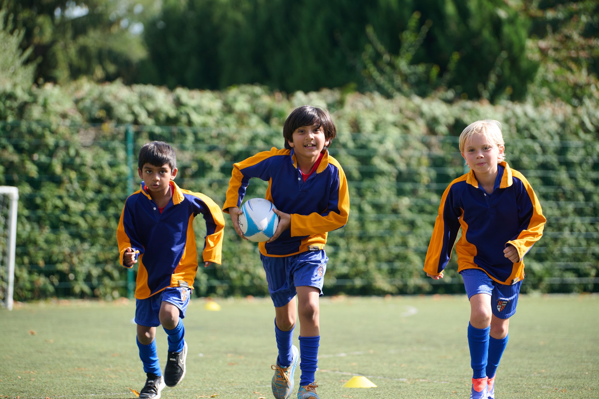 Loyola boys playing rugby