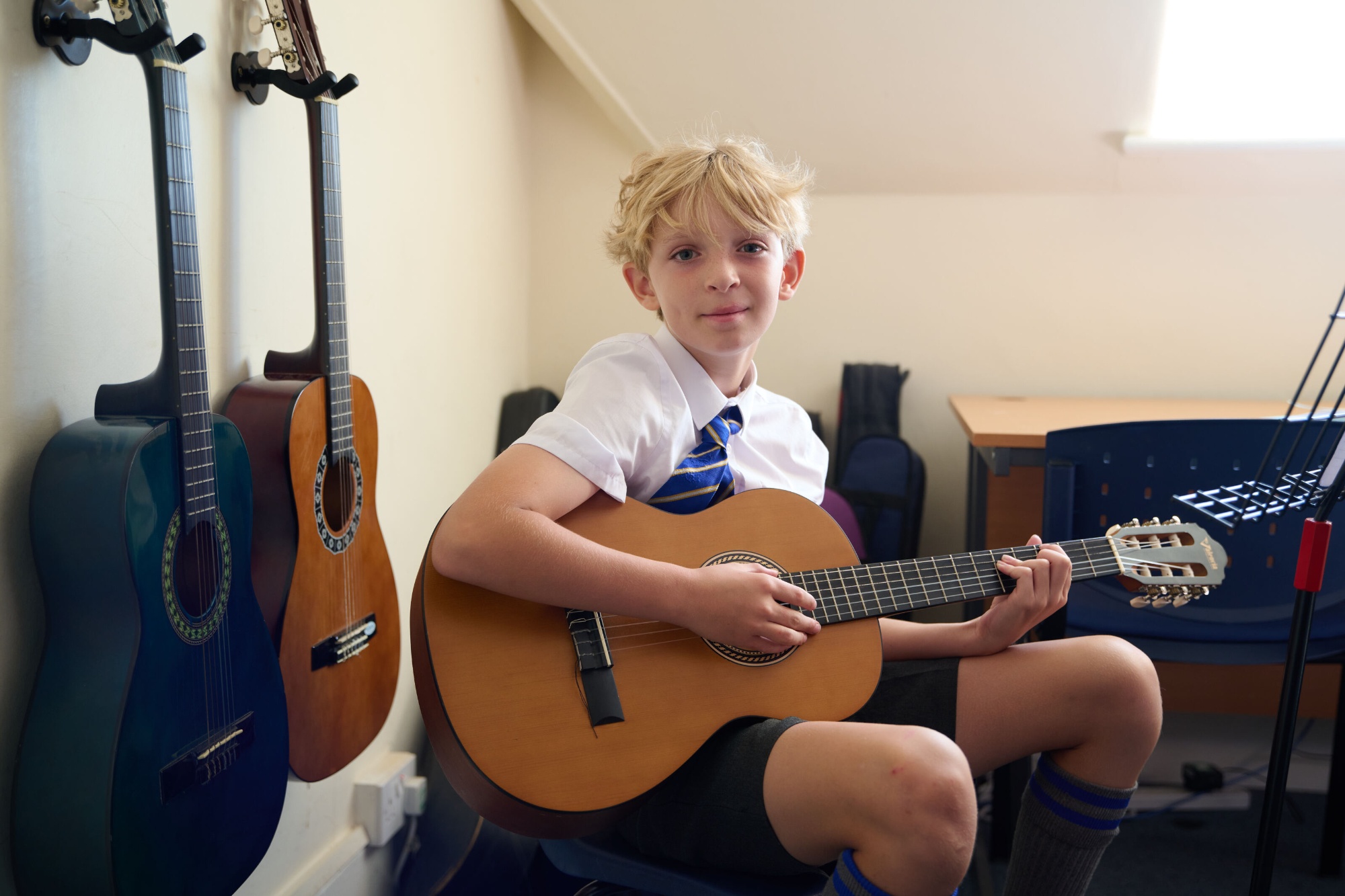 Boy playing guitar